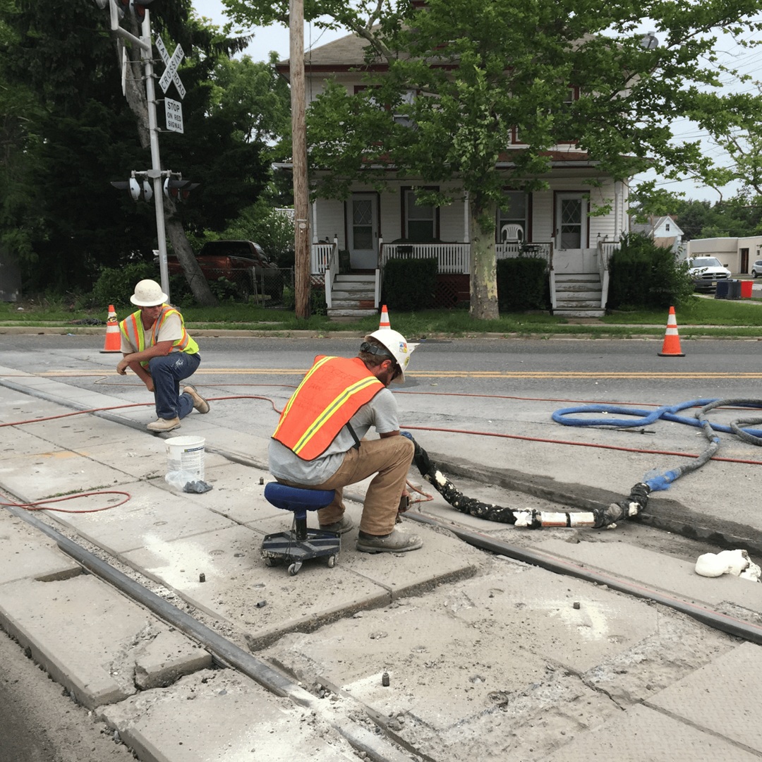 CJGeo workers using CJGrout