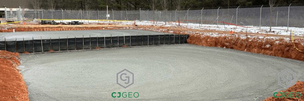A large pit partially filled with CJFill-Ultra Lightweight cellular concrete.