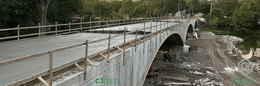 CJFill-Ultra Lightweight cellular concrete being placed over an arch bridge.