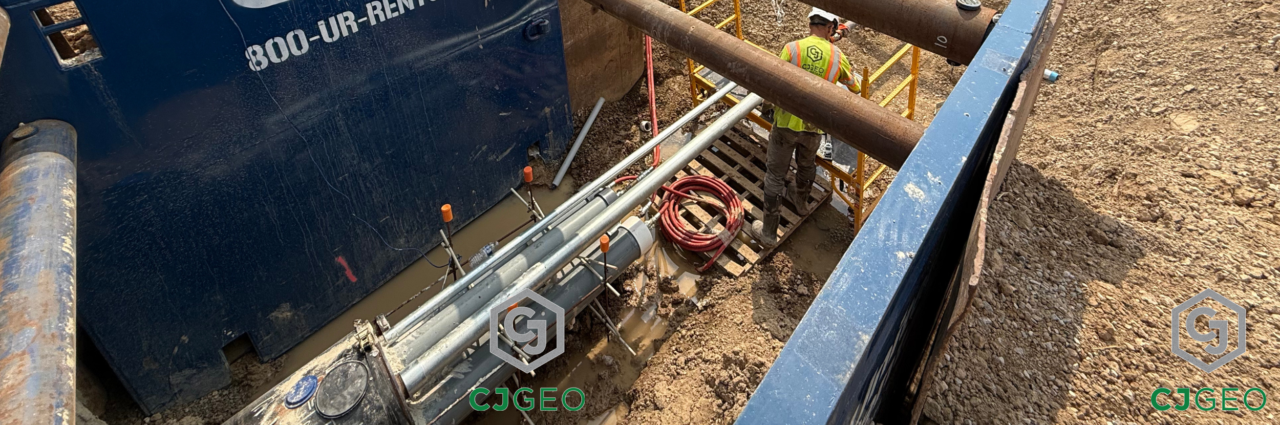 Multiple electrical conduits extending beyond a jack & bore casing on a thermal grouting project.