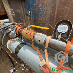 sf6643 michigan thermal grouting square A pressure gauge reading 1.19 psi during placement of thermal grout with multiple conduits.