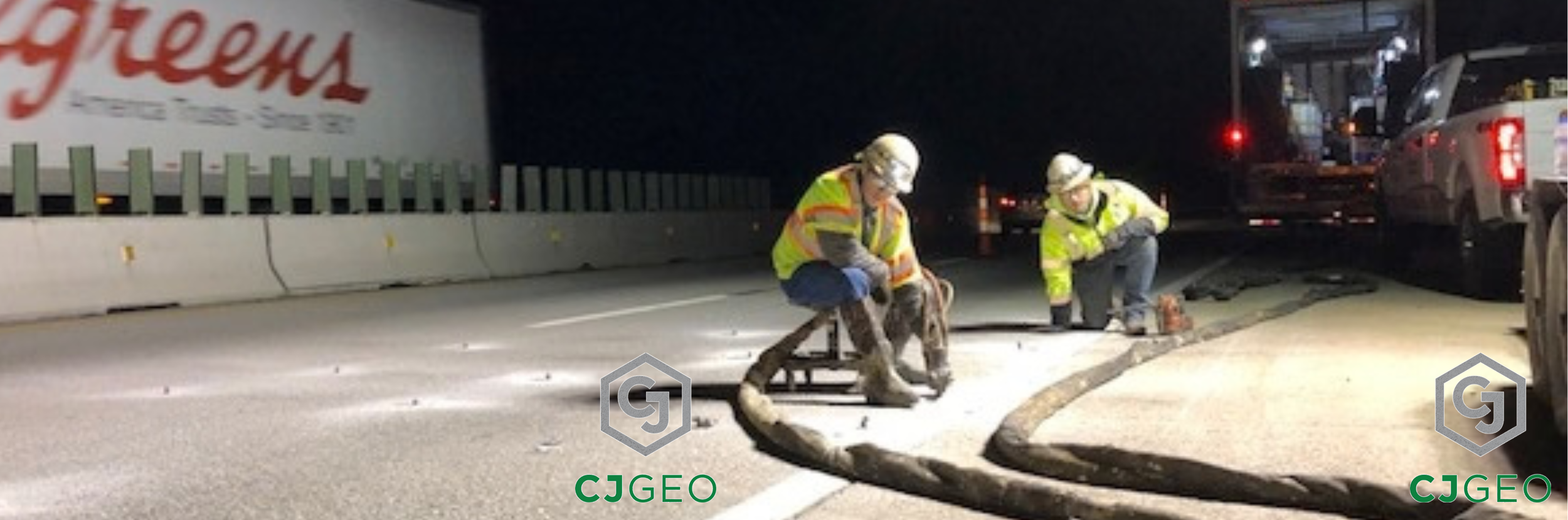 two workers injecting polyurethane grout under concrete pavement at night