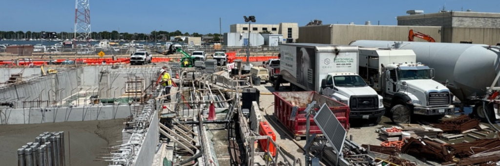 CJGeo cellular concrete batching equipment on a congested construction site. 