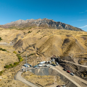 Mount Timpanogos and sky, with a construction site at the base
